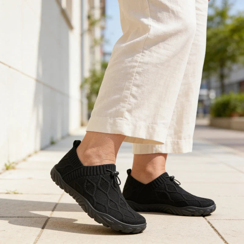 Grace & Ease customer wearing the black pair in the street